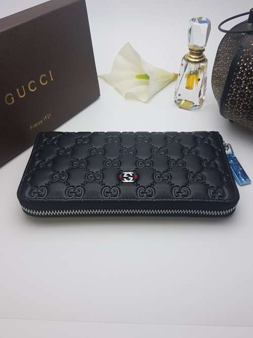BRAND NEW GUCCI GENUINE LEATHER DESIGNER  WALLET FOR SALE