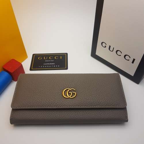 BRAND NEW GUCCI GENUINE LEATHER DESIGNER  WALLET FOR SALE