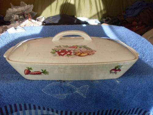Beautiful old casserole dish with spider veins from heat
