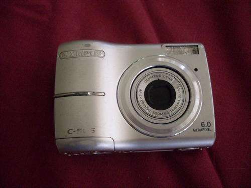 Olympus C-505 with memory card.  Camera working but viewing screen broken No Baterries included