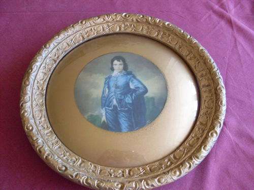 Beautiful old metal frame with convex glass.  Gold colour.  Excellent condition.