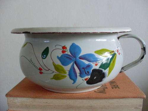 Very old enamel chamber pot with flower motif