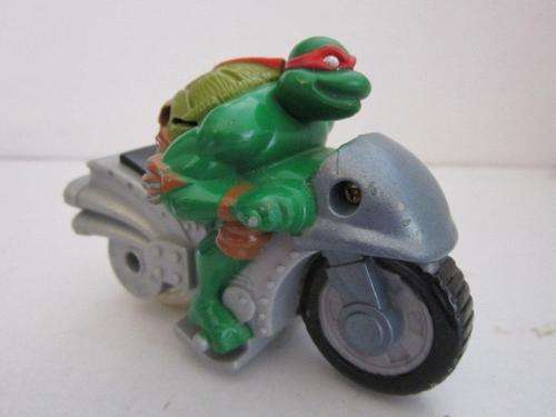 TMNT Raphael Teenage Mutant Ninja Turtle on a bike +- 9cm long 2003 Mirage Studios