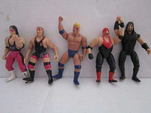 5 x WWE Hard Rubber Articulated Wrestlers
