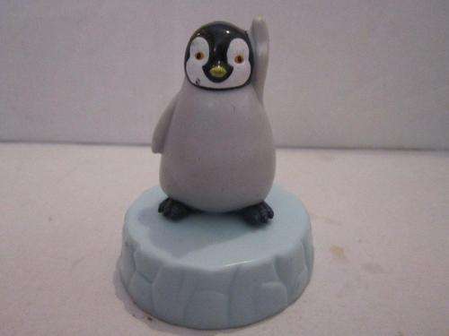 KFC  Happy Feet 2011 - turns with button on back