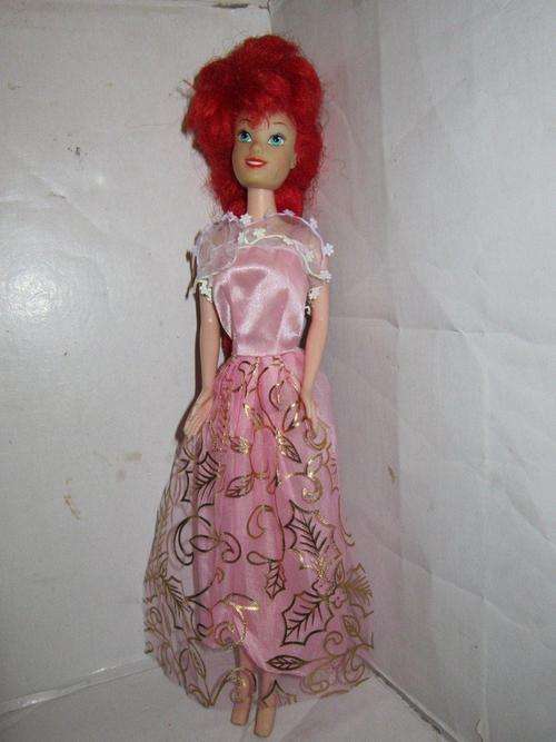 Disney Princess with very long red hair not sure which movie - made for Disney