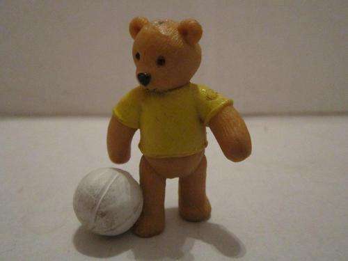 Small Hard Rubber Teddy playing football +-5.5cm from 1995