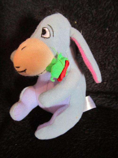 Winnie the Pooh's Eeyor - Flower in mouth- Woolworths +-13cm