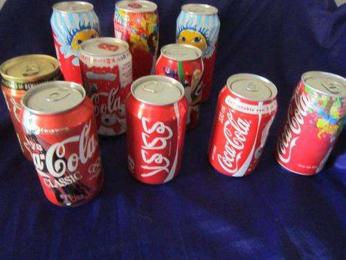 10 unopened Coca-Cola Coke Cans From around the World and S.A