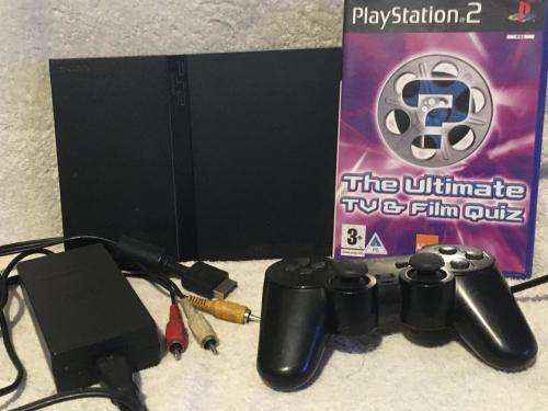 Playstation 2 - Black Slim Line Console c/w 1 x Original Controller, AV Cable + Psu, & 1 x Game