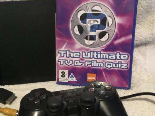 Playstation 2 - Black Slim Line Console c/w 1 x Original Controller, AV Cable + Psu, & 1 x Game