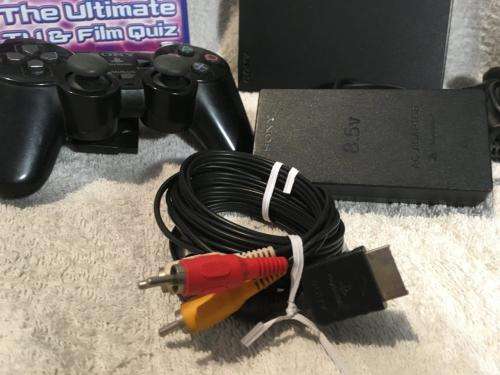 Playstation 2 - Black Slim Line Console c/w 1 x Original Controller, AV Cable PSU & 1 x Game