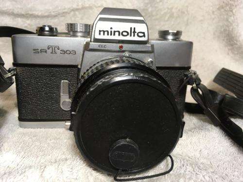 Vintage Minolta SRT303 c/w 50mm Lense + Bushnell Automatic 1:3,5 1=200mm Lense