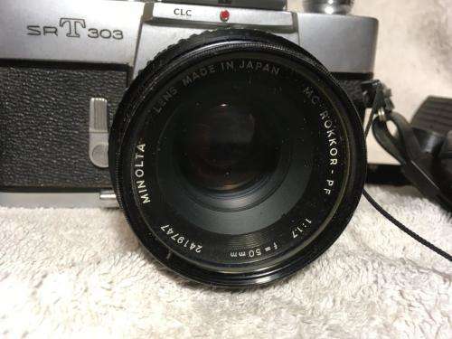 Vintage Minolta SRT303 c/w 50mm Lense + Bushnell Automatic 1:3,5 1=200mm Lense