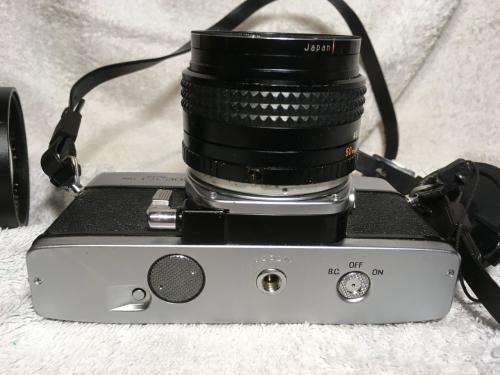 Vintage Minolta SRT303 c/w 50mm Lense + Bushnell Automatic 1:3,5 1=200mm Lense