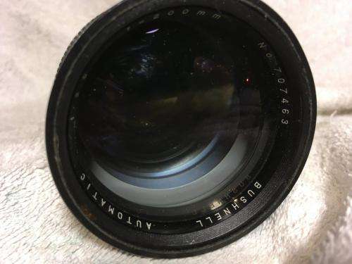 Vintage Minolta SRT303 c/w 50mm Lense + Bushnell Automatic 1:3,5 1=200mm Lense