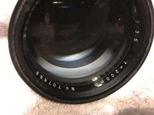 Vintage Minolta SRT303 c/w 50mm Lense + Bushnell Automatic 1:3,5 1=200mm Lense