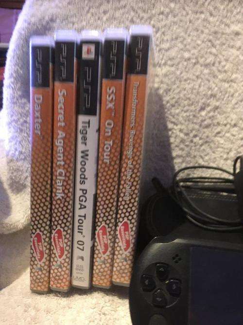 PSP Street, 32MB Memory Card Charger, Carry Case, 5 Games + 4 UMD Music videos