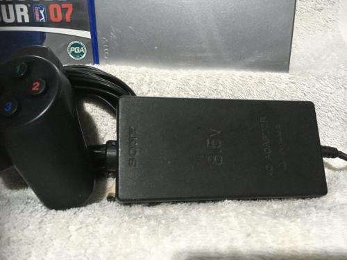Playstation 2 - Silver Slim Line Console c/w 1 x New Generic Controller, AV Cable PSU & 1 x Game