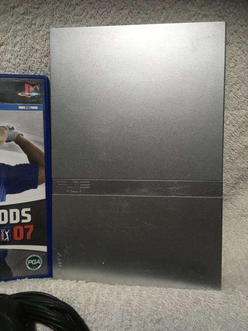 Playstation 2 - Silver Slim Line Console c/w 1 x New Generic Controller, AV Cable PSU & 1 x Game