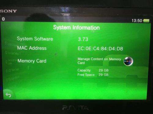 Sony PSVITA PCH2000 c/w Charger + charging cable 32 Gig memory card + Carry Case