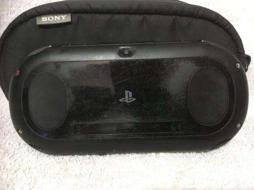 Sony PSVITA PCH2000 c/w Charger + charging cable 32 Gig memory card + Carry Case