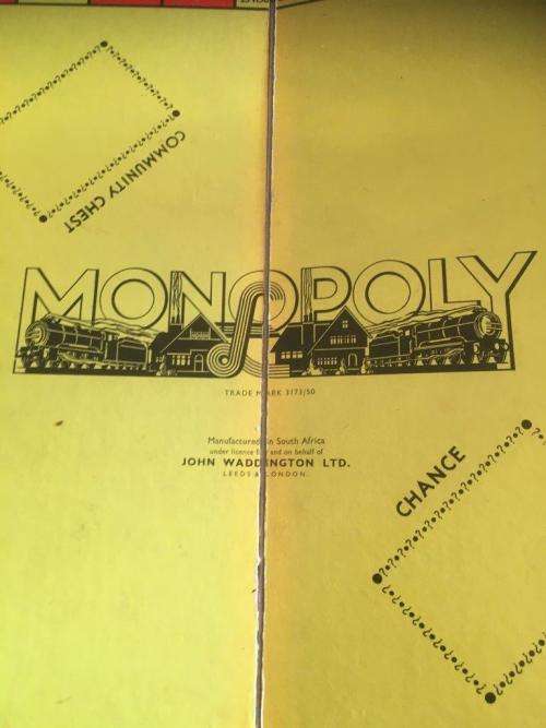 Vintage Monopoly UK Version with Wooden Houses and Hotels and Metal Playing Pieces (Circa 1950`s)