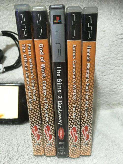 PSP 3004, 512MB Memory Card Charger, 5 Games + 4 UMD Music videos