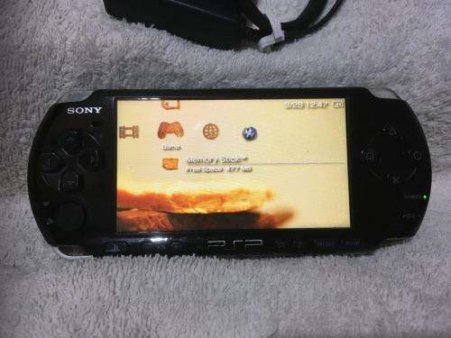 PSP 3004, 512MB Memory Card Charger, 5 Games + 4 UMD Music videos