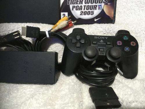 Playstation 2 - Black Slim Line Console c/w 1 x Original Controller, AV Cable PSU and 1 x Game