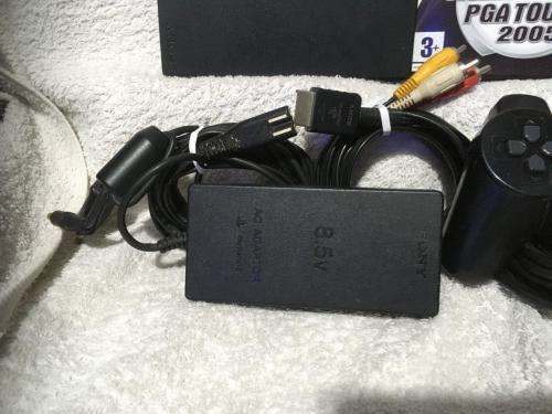 Playstation 2 - Black Slim Line Console c/w 1 x Original Controller, AV Cable PSU and 1 x Game
