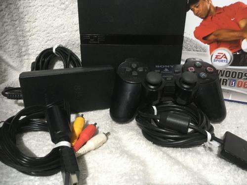 Playstation 2 - Black Slim Line Console c/w 1 x Original Controller, AV Cable PSU and 1 x Game