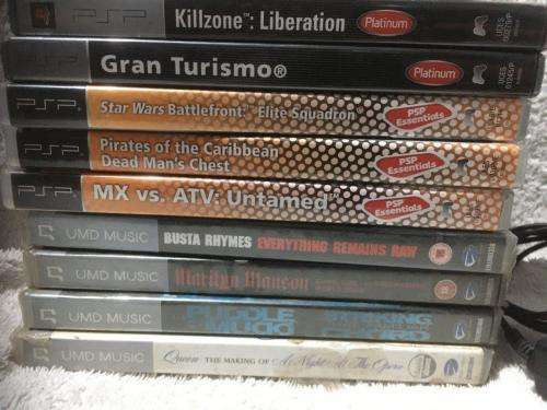 PSP 1004, 32MB Memory Card Charger, 5 Games + 4 UMD Music videos + Starter Kit