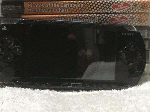 PSP 1004, 32MB Memory Card Charger, 5 Games + 4 UMD Music videos + Starter Kit