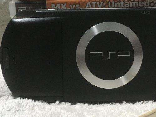 PSP 1004, 32MB Memory Card Charger, 5 Games + 4 UMD Music videos + Starter Kit