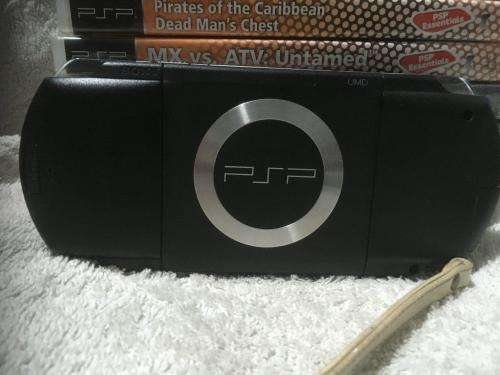 PSP 1004, 32MB Memory Card Charger, 5 Games + 4 UMD Music videos + Starter Kit
