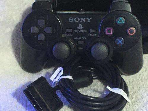 Playstation 2 - Black Slim Line Console c/w 1 x Original Controller, AV + Power Cable 1 x Game