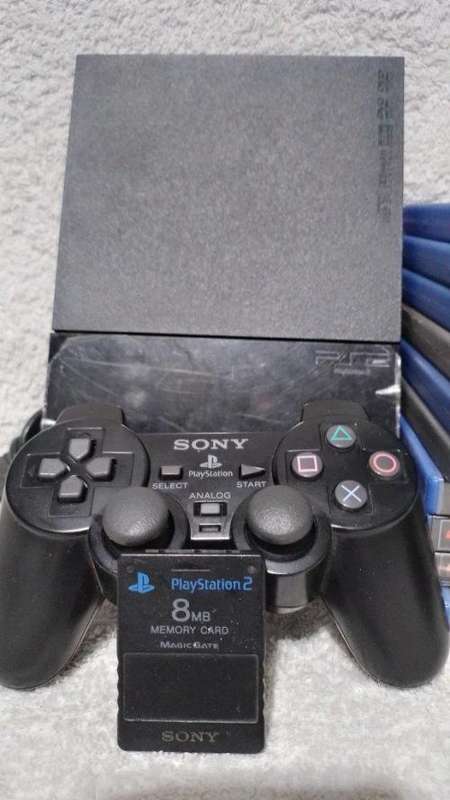 Playstation 2 - Black Slim Line Console c/w Original Controller, AV Cable PSU, Mem Card & 10 Games