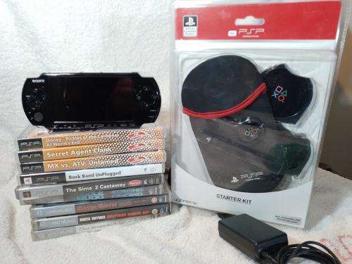 PSP 3004 Black, 4GB Memory Card, Charger, 5 Games + 4 UMD Music videos + Starter Kit