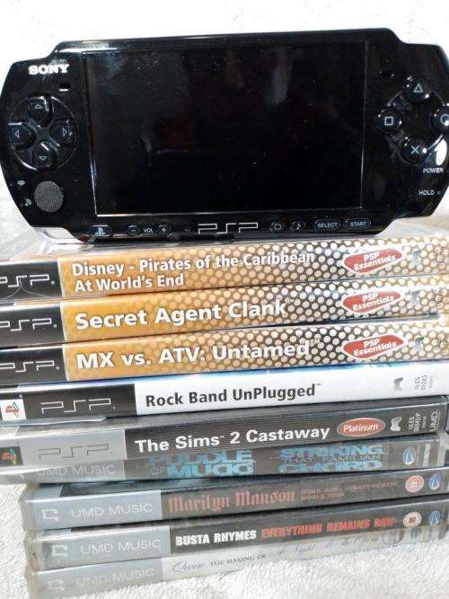 PSP 3004 Black, 4GB Memory Card, Charger, 5 Games + 4 UMD Music videos + Starter Kit