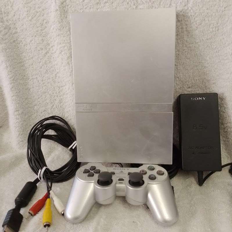 Playstation 2 - Platinum Silver Slim c/w 1 x Official Sony Controller, AV Cable & Power adapter