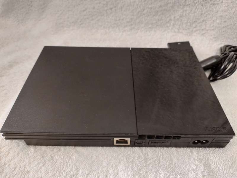Playstation 2 - Black Slim c/w 1 x New Generic Controller, AV Cable & Power Cord