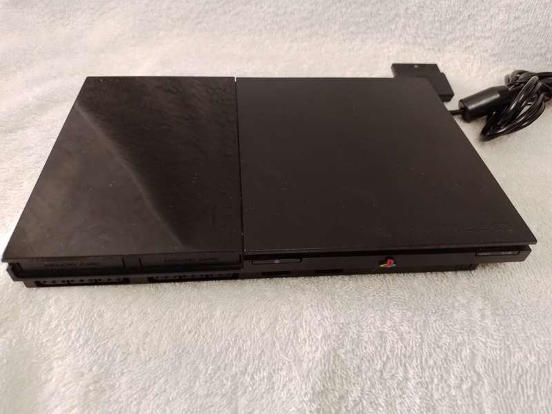 Playstation 2 - Black Slim c/w 1 x New Generic Controller, AV Cable & Power Cord