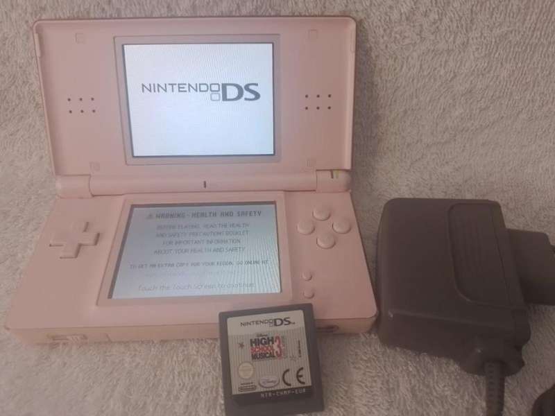 Nintendo DS Lite Pink, c/w Stylus, Charger + High School Musical 3 Cartridge.