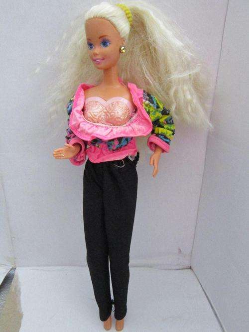 Barbie Doll Pretty doll with a unusual hard plastic Bra