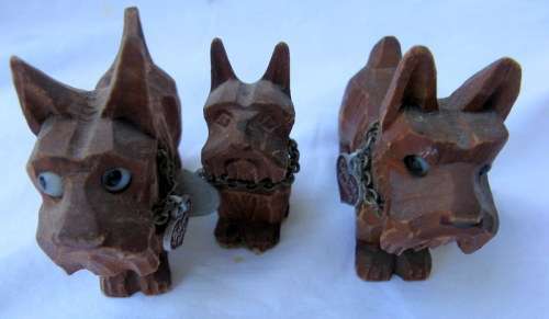 3 VINTAGE  HAND CARVED SCOTTIE DOGS : EACH WITH CHAIN & HEART SHAPED TAG (2 GERMAN 1 ENGLISH)