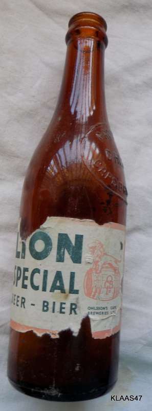 VINTAGE - OHLSSONS CAPE BREWERIES - EMPTY BOTTLE - PAPER LABEL LION SPECIAL BEER