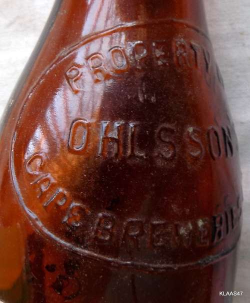 VINTAGE - OHLSSONS CAPE BREWERIES - EMPTY BOTTLE - PAPER LABEL LION SPECIAL BEER