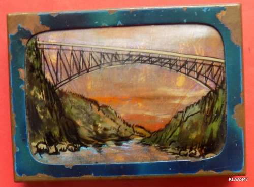 Small metal box  - Enamel edge around picture is chipped