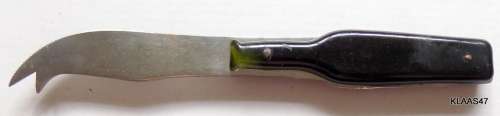 STAINLESS STEEL CHEESE KNIFE - BOTTLE SHAPED HANDLE - `SALT RIVER SWEET WORKS (PTY) LTD`